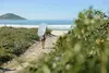 girl-walking-to-surf-in-australia-1536x1023.jpg