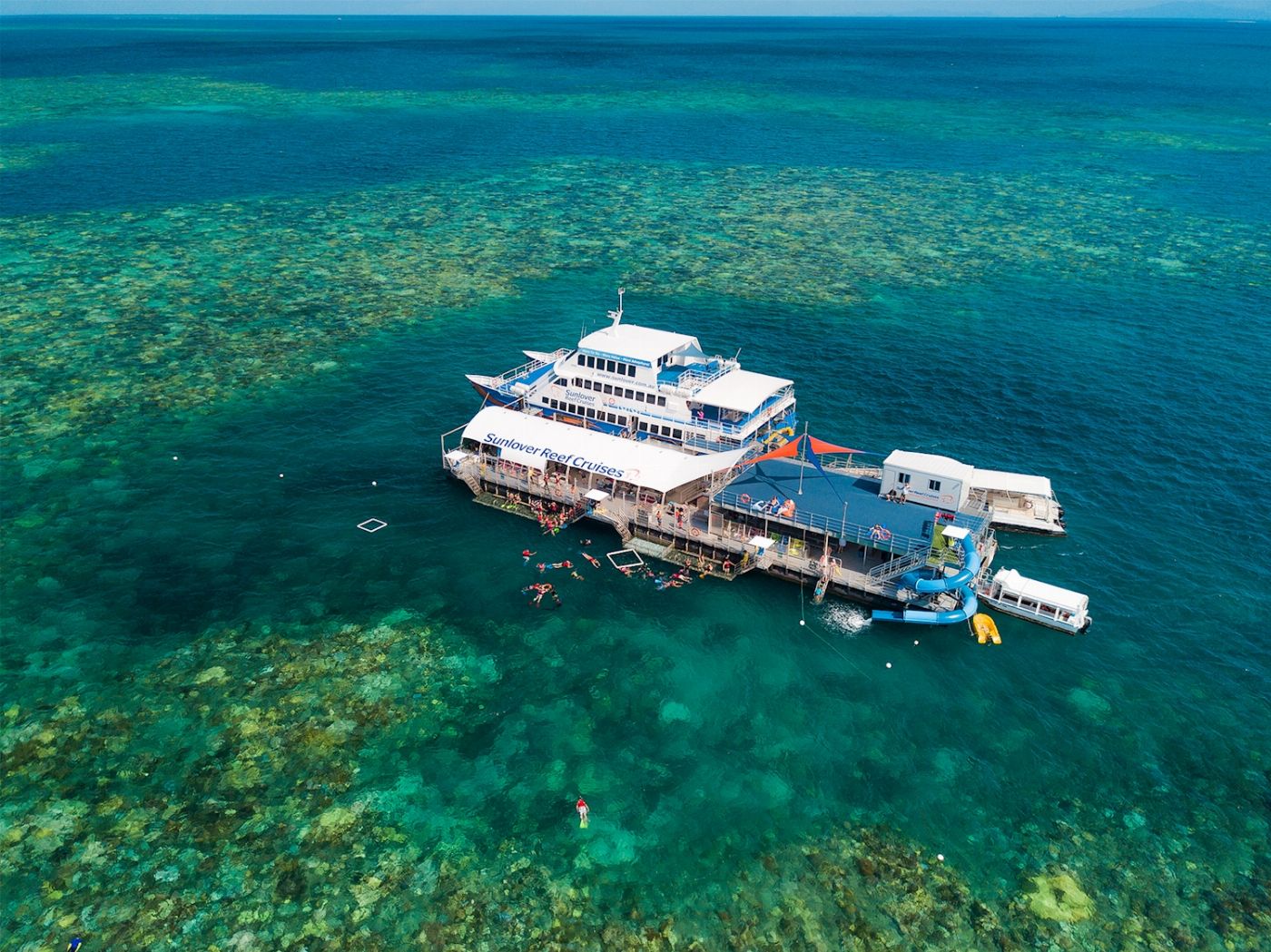 Sunlover Reef Cruises Moore Reef Pontoon Day Tour + Helicopter Ride (Family2A/2C) - Until 31 March 2027